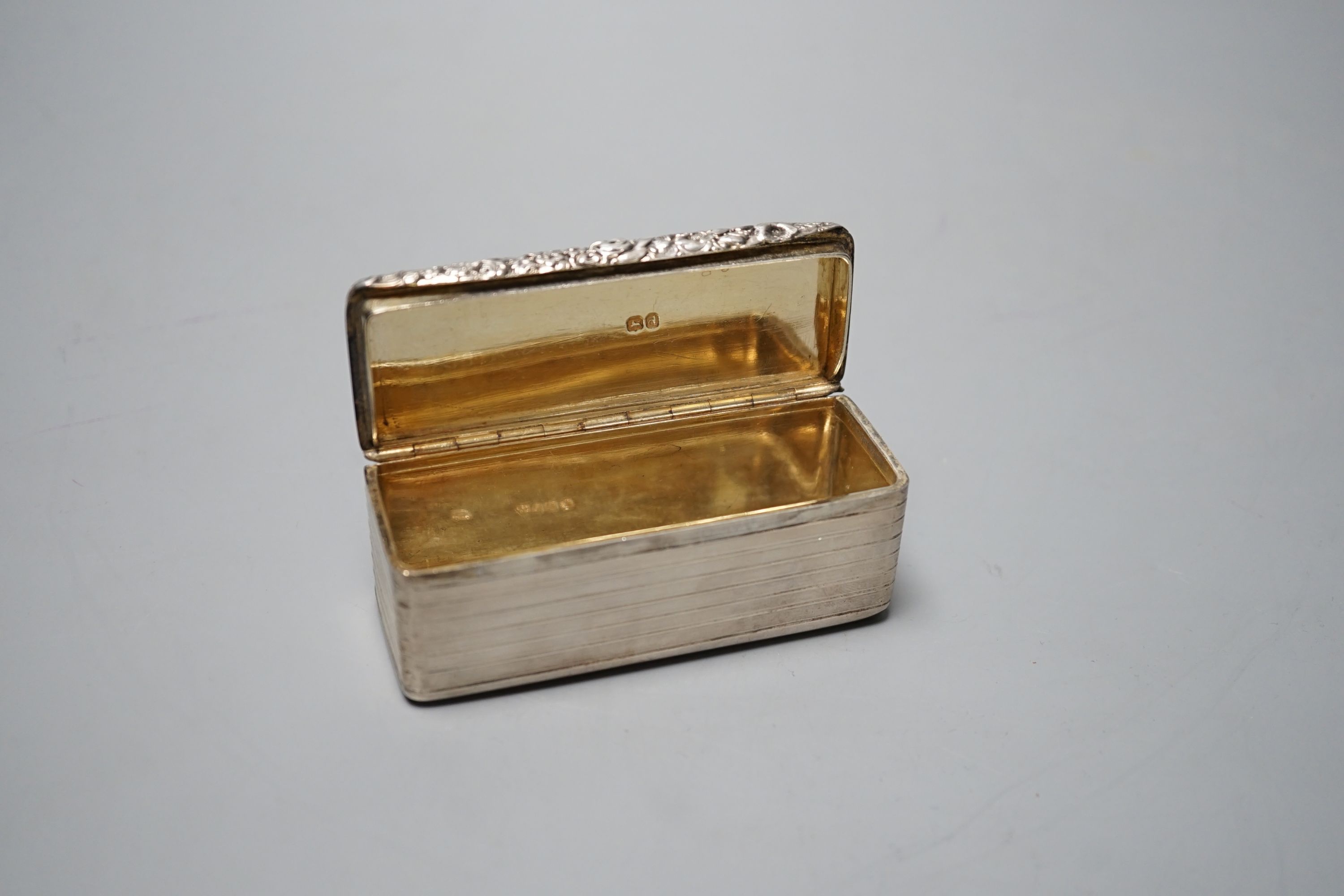 A late George III engine turned silver snuff box, by Thomas Edwards, London, 1819, 9cm.